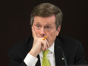 Toronto Mayor John Tory listens to the budget debate at the executive committee at City Hall on Monday, March 2, 2015. (Craig Robertson/Toronto Sun)