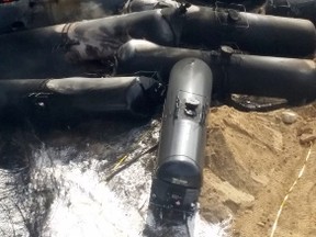 Smoke rises from fires caused by the derailment of a CN Railway train carrying crude oil near the northern Ontario community of Gogama in this March 8, 2015 handout photo from MPP Glenn Thibeault.