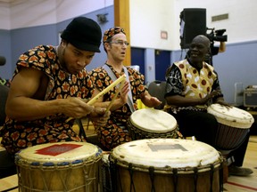 African traditional cultural drumming group Isokan Afrika! perform at the African Community Liaison Committe (ACLC) town hall meeting at the Africa Centre, 13160 127 St., in  Edmonton, AB on Wednesday, November 26, 2014 . TREVOR ROBB/EDMONTON SUN