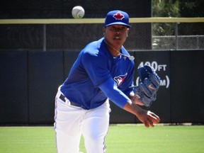 Pitcher Marcus Stroman and catcher Russell Martin worked together on Monday in a loss to the Pirates in Dunedin. (EDDIE MICHELS/PHOTO)