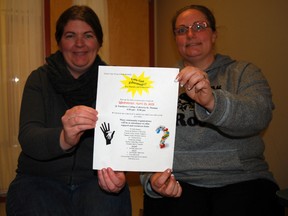 Melissa Lunn, left, and Tanya Hutchison of the St. Thomas-Elgin School Age Focus Group hold a poster for "Let's Get Educated." The event aims to connect parents and educators of school-age children with resources that can help them. (Ben Forrest, Times-Journal)