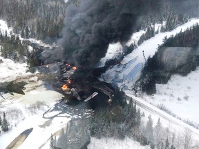 TSB Canada/Handout via Reuters
Smoke rises from fires caused by the derailment of a CN Railway train carrying crude oil near Gogama. The derailment, which occurred March 7, is CN's second in the region in just three days and the third in less than a month.