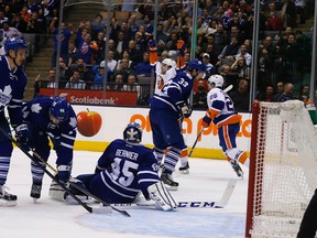 Islanders’ John Tavares scores the winning goal in overtime against the Maple Leafs at the ACC on Monday night. The Leafs blew a two-goal third-period lead. (MICHAEL PEAKE/TORONTO SUN)