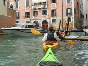 Tips on canal etiquette -- such as paddle single-file and always give way to hell-bent boat drivers -- come in handy on the busier waterways of Venice. JANIE ROBINSON PHOTO