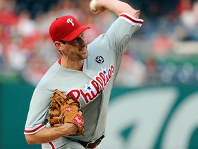Philadelphia Phillies starting pitcher Cliff Lee (33) throws during the second inning against the Washington Nationals at Nationals Park. (Brad Mills-USA TODAY Sports)