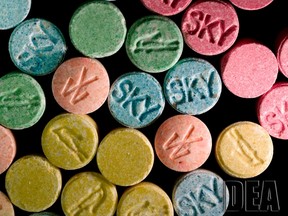 Ecstasy pills, which contain MDMA, are pictured in this undated handout file photo by the United States Drug Enforcement Administration (DEA). Sniffer dogs, pat-downs and other drug screening measures await concertgoers during this summer music festival season in the wake of 2013 concert deaths linked to the club drug Molly, a mashup of MDMA, the component in the drug Ecstasy, and unregulated synthetic stimulants.      To match USA-DRUGS/CONCERTS      REUTERS/U.S. DEA/Handout via Reuters/Files