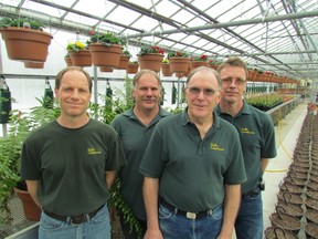 From left, Chad Praill, Sean Praill, Bruce Praill and Ian Praill stand in a greenhouse at Praill's Greenhouse on Blackwell Road in Sarnia. The family-owned business is celebrating its 100th anniversary this year.
Tuesday March 10, 2015 in Sarnia, Ont. (Sarnia Observer)