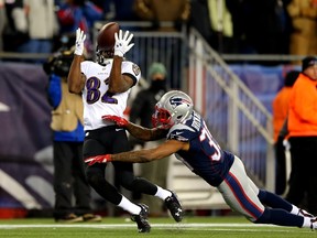 Torrey Smith of the Baltimore Ravens makes a catch against LeGarrette Blount #29 of the New England Patriots in the third quarter during the 2015 AFC Divisional Playoffs game at Gillette Stadium on January 10, 2015. (Elsa/Getty Images/AFP)