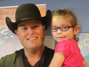 Country singer Gord Bamford meets up with Kristine Swereda while visiting Hotel Dieu Hospital on Tuesday afternoon. (Michael Lea/The Whig-Standard)