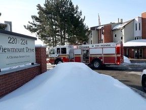 Paramedics, firefighters and police were called to a seniors' high-rise at 220 Viewmount Drive in Ottawa Sunday March 10,  2015. The man has suffered serious injuries due to a elevator accident.  Tony Caldwell/Ottawa Sun/QMI Agency