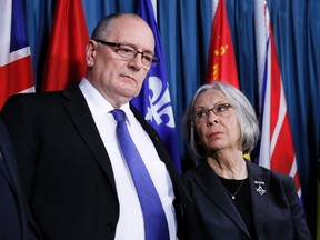 Sheila Fynestakes part in a news conference with her husband, Shaun Fynes, following the release of a report looking into the suicide of her son, Cpl. Stuart Langridge, on Parliament Hill in Ottawa, March 10, 2015. (CHRIS WATTIE/Reuters)
