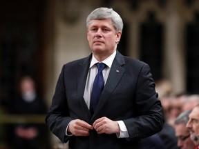 Prime Minister Stephen Harper stands to speak during Question Period in the House of Commons on Parliament Hill in Ottawa, March 10, 2015. (CHRIS WATTIE/Reuters)