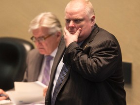 Councillor Rob Ford walks around council floor during questions on the budget Tuesday, March 10, 2015. (Craig Robertson/Toronto Sun)