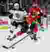 Ottawa Senators Patrick Wiercioch battles for a loose puck with Boston Bruins Carl Soderberg during NHL hockey action at the Canadian Tire Centre on Tuesday March 10, 2015. Errol McGihon/Ottawa Sun/QMI Agency