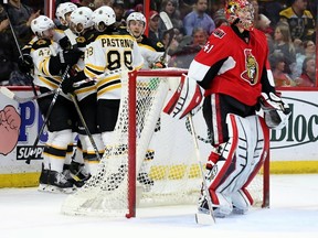 Ottawa Senators goaltender Craig Anderson looks on as the Boston Bruins scored their 3rd goal of the game during NHL hockey action at the Canadian Tire Centre on Tuesday March 10, 2015. Errol McGihon/Ottawa Sun/QMI Agency