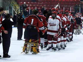 The Norwich Merchants and Ayr Centennials shake hands after the Centennials won the Midwestern Junior Hockey League finals in Game 4 in Norwich Tuesday March 10, 2015. The Centennials swept their series and went undefeated in all 12 of their playoff games and will head to the Schmalz Cup as the MHL representative. (GREG COLGAN, Sentinel-Review)