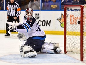 Jets goalie Michael Hutchinson gives up one of his four goals on just seven shots.
