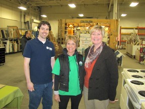 ReStore manager Brian Stewart, volunteer Pauline Gilmour and Habitat for Humanity Chatham-Kent executive-director Nancy McDowell pose in the store during the open house held March 7.