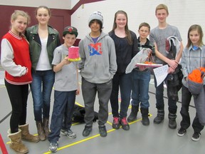 These Grade 7 and 8 students from Tilbury Area Public School were among those part in an engineering challenge on March 7 at John McGregor Secondary School organized by the Chatham-Kent chapter of the Professional Engineers of Ontario. From left: Hilary Woodcock, Jessica Banman, Nick Leverton, Nick Jaynes, Jaclyn Cook, Tristen McLean, Peter Friesen and Relja Vojvodic.