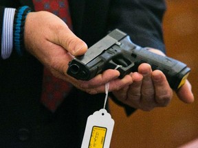 A Glock 21 handgun is shown during the murder trial for former NFL player Aaron Hernandez at the Bristol County Superior Court in Fall River, Massachusetts, March 11 2015.  (REUTERS/Dominick Reuter/Pool)