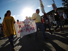 Party of the Democratic Revolution (PRD) members protest over 43 missing students in the Mexican state of Guerrero, where mayoral candidate Aide Nava was kidnapped and decapitated. (REUTERS/Jorge Dan Lopez)