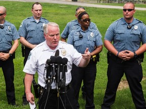 Ferguson Police Chief Thomas Jackson answers questions from the media about his office's handling of the release of information following the shooting of Michael Brown in Ferguson, Missouri in this August 15, 2014 file photo.   REUTERS/Lucas Jackson