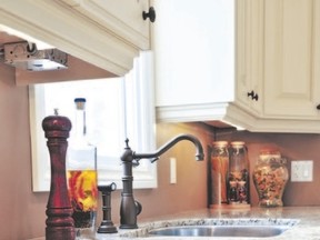 Choosing kitchen cabinets and countertops are among the decisions new home buyers can make to customize their home.