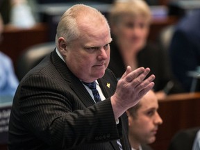 Councillor Rob Ford talks about his motions to cut costs during budget debate in Toronto Wednesday, March 11, 2015. (Craig Robertson/Toronto Sun)