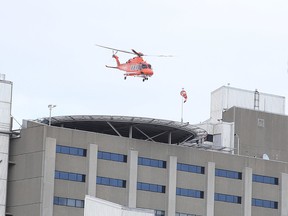An Ornge air ambulance helicopter lifts off from the Health Sciences North helipad on Wednesday afternoon in Sudbury, Ont. on Wednesday March 11, 2015. Gino Donato/Sudbury Star/QMI Agency