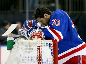 Cam Talbot of the New York Rangers prepares for the game against the Vancouver Canucks February 19, 2014 at Madison Square Garden in New York. (Elsa/Getty Images/AFP)