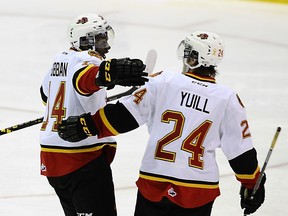 Jordan Subban #14 and Alex Yuill #24 of the Belleville Bulls celebrate a goal against the Mississauga Steelheads during OHL game action on January 16, 2015 at the Hershey Centre in Mississauga, Ontario, Canada. (Graig Abel/Getty Images/AFP)
