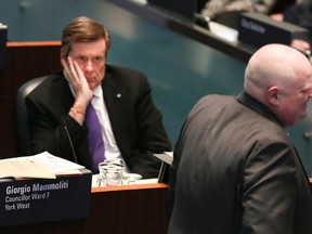 Toronto Mayor John Tory and Councillor Rob Ford in City Hall council chambers. (Veronica Henri/Toronto Sun)