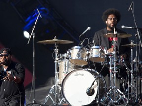 Tariq "Black Thought" Trotter (L) and Ahmir "Questlove" Thompson of the band The Roots perform during the Global Citizen Festival concert in Central Park in New York September 27, 2014. (REUTERS/Carlo Allegri)