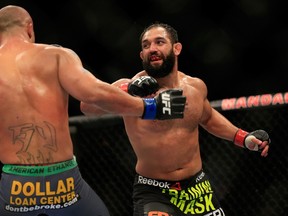 Johny Hendricks punches Robbie Lawler in their welterweight title fight during the UFC 181 event at the Mandalay Bay Events Center on December 6, 2014. (Alex Trautwig/Getty Images/AFP)