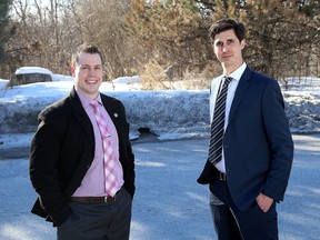 Kingston city councillors Ryan Boehme, left, of Pittsburgh District and Richard Allen,  of Countryside at the foot of Gore Road where a new bridge may be built  on Thursday March 12 2015. (Ian MacAlpine/The Whig-Standard)