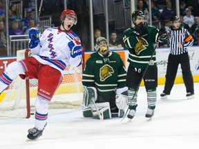 Kitchener Rangers? Darby Llewellyn celebrates his team?s second goal in front of Knights goalie Tyler Parsons and forward Owen MacDonald during the first period of their OHL game against the London Knights at Budweiser Gardens on Thursday night. The Rangers had lots to celebrate as they crushed the Knights 8-1. (DEREK RUTTAN, The London Free Press)