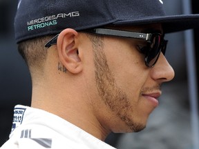 In their 2014 world championship seaso,n the Mercedes factory was a two-car juggernaut with Lewis Hamilton (pictured) and Nico Rosberg. (AFP/PHOTO)