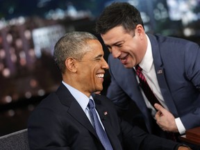 U.S. President Barack Obama laughs with show host Jimmy Kimmel during a commercial break in a taping of Jimmy Kimmel Live in Los Angeles on March 12, 2015. (REUTERS/Jonathan Ernst)