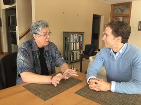 Craig Kielburger, right, talks with Thomas King at King’s home in Guelph, Ontario. (Handout)