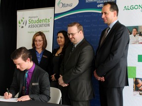 City of Ottawa and Algonquin representatives were on hand Friday, March 13, 2015 to officially sign the deal that brings the U-Pass to Algonquin.
(Dylan Conway-Hartwick/Ottawa Sun)