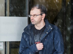 Michael Hughes leaves the Elgin Street courthouse on Friday March 13, 2015. 
Errol McGihon/Ottawa Sun/QMI Agency