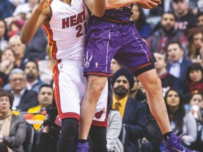 Tyler Hansbrough grabs a rebound in front of the Miami Heat’s Hassan Whiteside on Friday night. (ERNEST DOROSZUK/Toronto Sun)