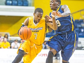 Ryerson guard Jahmal Jones, driving around Alex Campbell of Windsor in Thursday’s CIS quarterfinal, was ‘spectacular at the rim’ against the Lancers, says coach Roy Rana, and could be even better in Saturday night’s semifinal against the Gee-Gees. (ERNEST DOROSZUK, Toronto Sun)