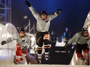 Team Grey Mouse races in the team competition during the Red Bull Crashed Ice Ice Cross Downhill World Championship in Edmonton, Alta., on Friday,  March 13, 2015. Ian Kucerak/Edmonton Sun/ QMI Agency