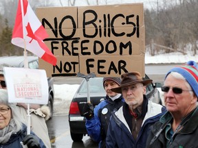 About 100 people in Belleville, Ont. join the cross-Canada protest against Bill C-51 to express their concerns about the Conservatives Government's anti-terror bill at MP of Prince Edward-Hastings Daryl Kramp's office on Millennium Drive Saturday, March 14, 2015.  - Jerome Lessard/Belleville Intelligencer/QMI Agency