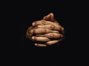 Hands praying. 

(Fotolia)