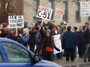 About 200 Bill C-51 opponents voice their concerns during a Day of Action event protesting new policing powers outside City Hall in peterborough on Saturday, March 14, 2015. Clifford Skarstedt/Peterborough Examiner/QMI Agency