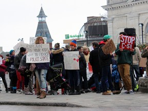 Over 200 people came out to Springer Market Square to protest the federal government's new proposed anti-terrorism legislation Bill-C51 in Kingston, Ont. on Saturday March 14, 2015.  Steph Crosier/Kingston Whig-Standard/QMI Agency