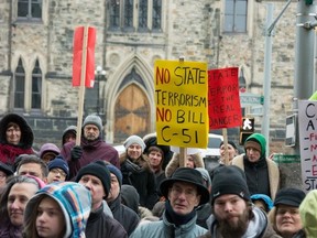 Protesters gather on the corner of Elgin Street and Wellington Street to protest the Conservative government's Bill C-51, Saturday, March 14, 2015. The group of several hundred people marched to Parliament Hill where other political supporters spoke to the crowd in support.
Submitted photo by Sam Heaton.
OTTAWA SUN/QMI AGENCY