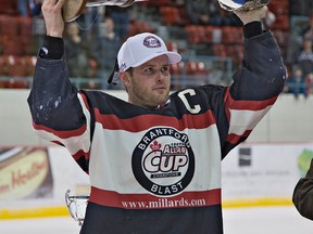 Brantford Blast captain Chad Spurr hoists the J. Ross Robertson Cup last April in Brantford. With no B.C. representation, the future of the national championship could be in jeopardy. (Brian Thompson, QMIO Agency)